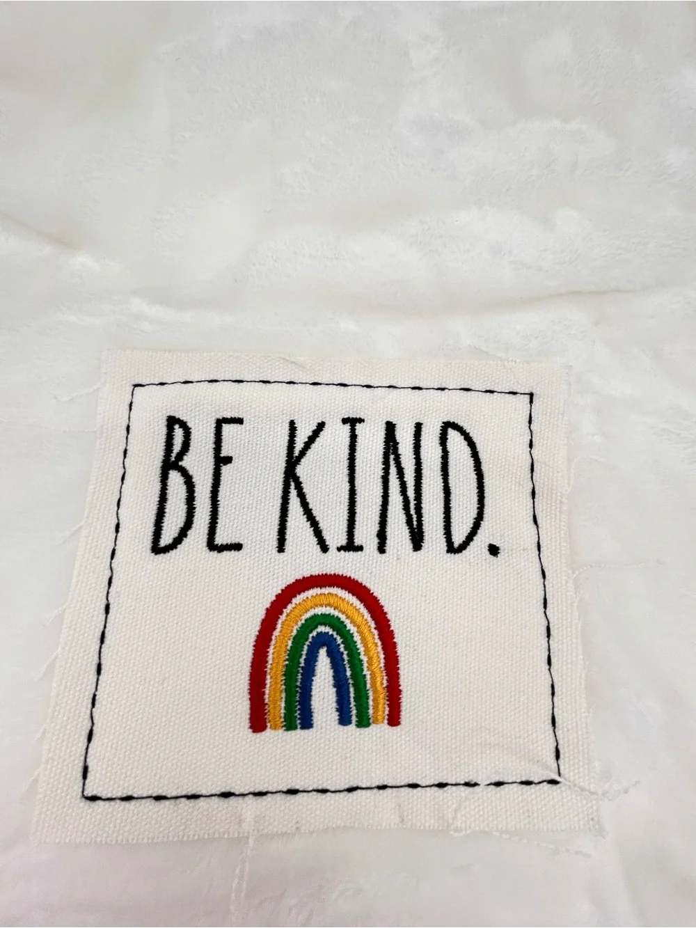 Rae Dunn White Plush Baby Blanket with Rainbow 'Be Kind' Patch